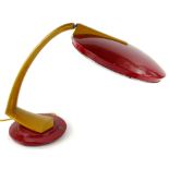 A vintage Spanish 1960's Fase table lamp, in red and gold colours, with circular top, on a fixed