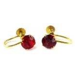 A pair of paste set earrings, each set with red paste stone, in yellow metal setting, stamped 9ct,