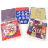 Various United Kingdom brilliant uncirculated coin collection sets, 2002, 1997, 1990, an Epcot