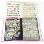 Various stamps and philately. A pink album containing world used stamps, New Zealand 1970's and 80'
