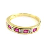 A 9ct gold half hoop eternity ring, set with five baguette cut rubies totalling approx 0.6cts