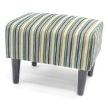 A Grabal Alok foot stool, of rectangular form, overstuffed in striped material, on tapering