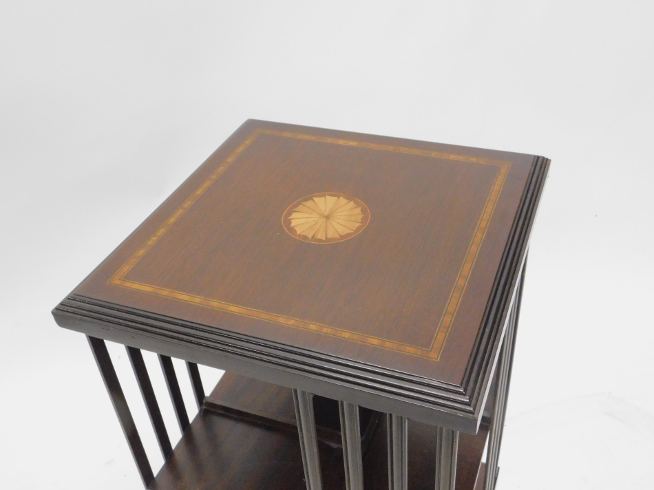 An early 20thC Sheraton revival mahogany and boxwood strung revolving bookcase, of square form on an - Image 2 of 2