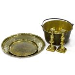 An early 20thC brass jam pan, Eastern tray and two baluster shaped candlesticks, on shaped feet,