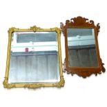 A mahogany fret framed wall mirror in George III style, with reeded border, 63cm x 37cm, and a