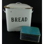 An early 20thC enamel bread bin, with domed lid and fixed handles, in blue, white and black, 32cm