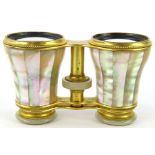 A pair of early 20thC J S Scott Paris & Hull mother of pearl opera binoculars, with articulated