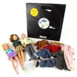 Various dolls, a Celluloid boy doll in clothing, 30cm high, various other clothing, Sindy type etc.,