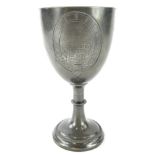 A 19thC pewter trophy, with inverted stem and circular beaded foot, the egg shaped body engraved