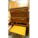 A mid 20thC oak bureau, 73cm wide, 42cm deep, (AF), a nest of lightwood tables and TV cabinet. (3,