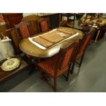 An Old Charm extending dining table and four chairs, 103cm high. (5)