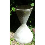 A concrete planter of waisted form, with shaped circular top, 94cm high, the top 47cm diameter.