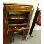 An oak side table, a nest of three walnut finish tables, the largest 55cm high, 68cm wide, 41cm deep