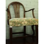 A 19thC mahogany open armchair, with a vase shaped splat, and a padded seat on channelled legs