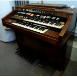 A Leslie Animation electric organ, with two banks of keys, further buttons and eight small and one