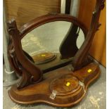 A Victorian mahogany table mirror, on shaped base with central box, 65cm wide.