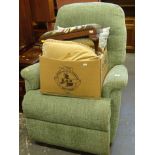 An electric reclining chair in green and black, check material, 106cm high, foot stool and various