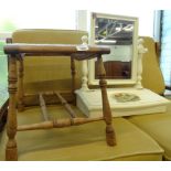 A light oak foot stool of shaped scroll form with bergere top, 36cm high, 47cm wide, 38cm deep and a