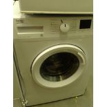 A Beko 7KG 1200rpm A+++ washing machine, WTB720E1W, 84cm high, 58cm wide, 49cm deep.
