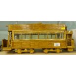 A scratch built tram, made from match sticks in the prisoner of war style, 21cm high.