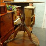 A 19thC mahogany occasional table, the circular top on a vase shaped turned support with tripod