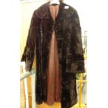 A ladies faux fur coat, three quarter length.