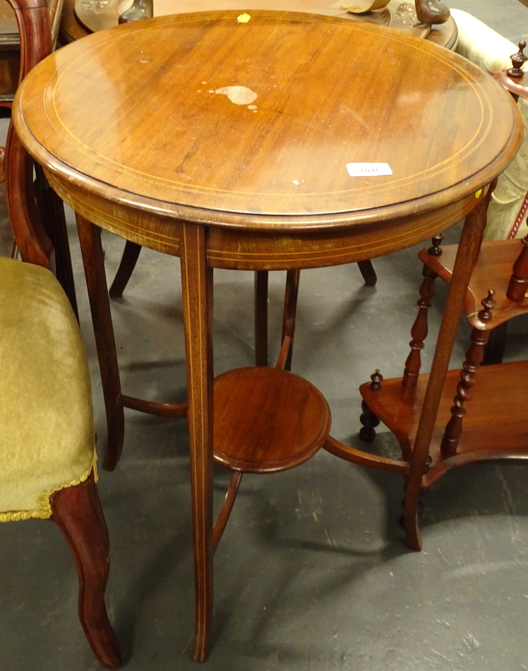 An Edwardian mahogany boxwood strung and chequer banded occasional table, the circular top with