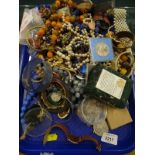 Various costume jewellery, bangles, necklaces, beads, bead necklaces, cased coin etc. (1 tray).