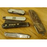 Various pen knives, mother of pearl finish etc., one with a shield cartouche and two folding blades,