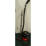 A Henry vacuum cleaner and a metal planter box, 43cm wide. (2)