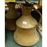 A graduated pair of Eastern copper vessels, each with bell shaped bodies, plain handles and