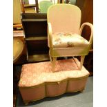 A Lloyd loom style lidded blanket box, with a serpentine front in peach, a similar design chair