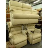 A three piece cream leather suite, comprising two seater settee, 144cm wide and two electric