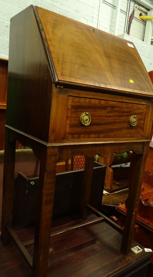 An early 20thC mahogany single bureau with drawer beneath, on square legs, 103cm high, 54cm wide,