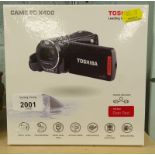 A Toshiba boxed Camileo X400 24X optical zoom camcorder.