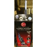 A boxed Hoover Generation Future Turbo Power Total Reach vacuum cleaner, 102cm high with