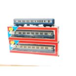 Two Lima OO-gauge InterCity coaches, BR Corporate blue livery, W1493, boxed, and another, M4950. (