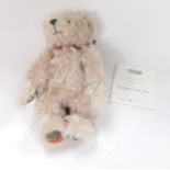 A Merrythought The Half Crown teddy bear, limited edition No. 82/450, plush jointed with tartan bow,