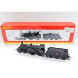 A Hornby OO gauge locomotive and tender LMS Single Caledonian, 14010, 4-2-2, R2683, boxed.