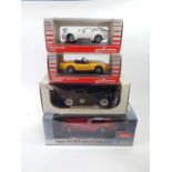 Four die cast sports cars, comprising Sunstar Jaguar XK140 drop head coupe, 1:18 scale., Signature