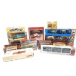 Three die cast models of pink El Dorado Cadillacs., Days Gone By and other die cast vehicles, some