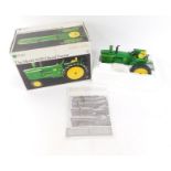 An Ertl Precision Classics diecast model of the Model 4020 diesel tractor, number 3, scale 1/16,