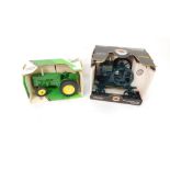 An Ertl John Deere model M tractor, 1:16 scale, boxed, and a McCormick-Deering model M (2).