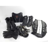 Men's and women's motorcycle clothing, to include ARMR lady's jacket and trousers, leather boots,