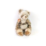 A Charlie Bears Pandy plush jointed teddy bear, CB0104643, in white, black and pink, with label,