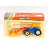 A Britains die cast Ford tractor with loader, TW-20 9584, boxed.