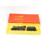 A Hornby OO-guage Class 2P locomotive and tender, LMS black livery, 4-4-0, 690, R450, boxed.