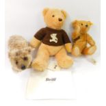 A Steiff Cosy Year plush jointed teddy bear, 663130, 2009, with brown knitted sweater, stitched to