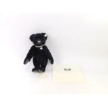 A Steiff Swarovski bear Krystina exclusive for the Danbury Mint, in black, with growl action,