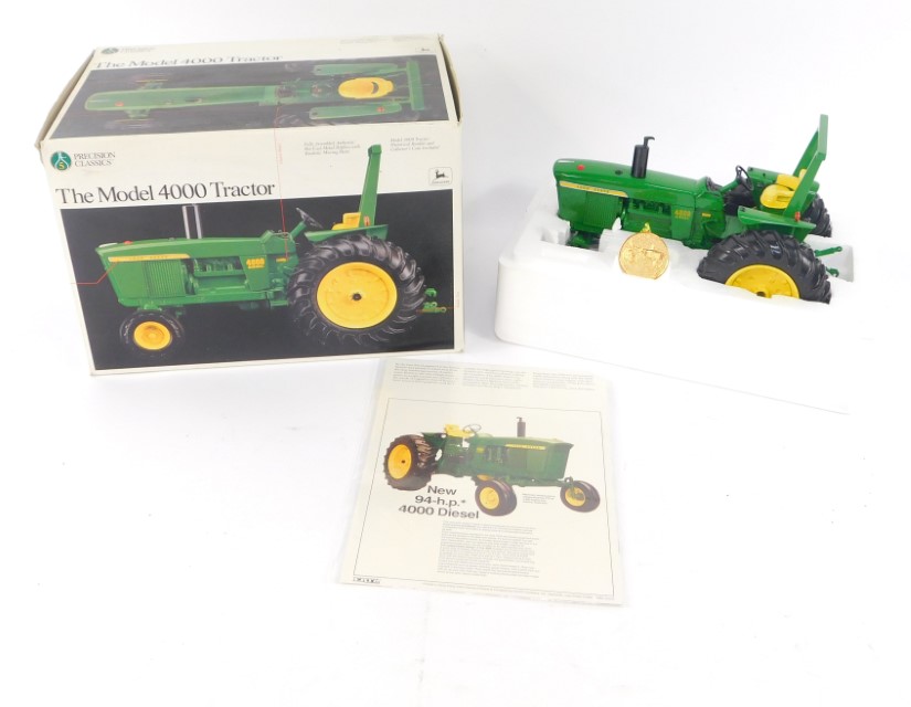 An Ertl Precision Classics diecast model of the Model 4000 tractor, number 5, scale 1/16, number
